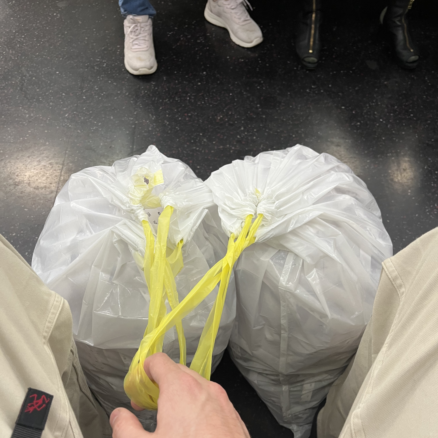 bags of ticker tape on the train
